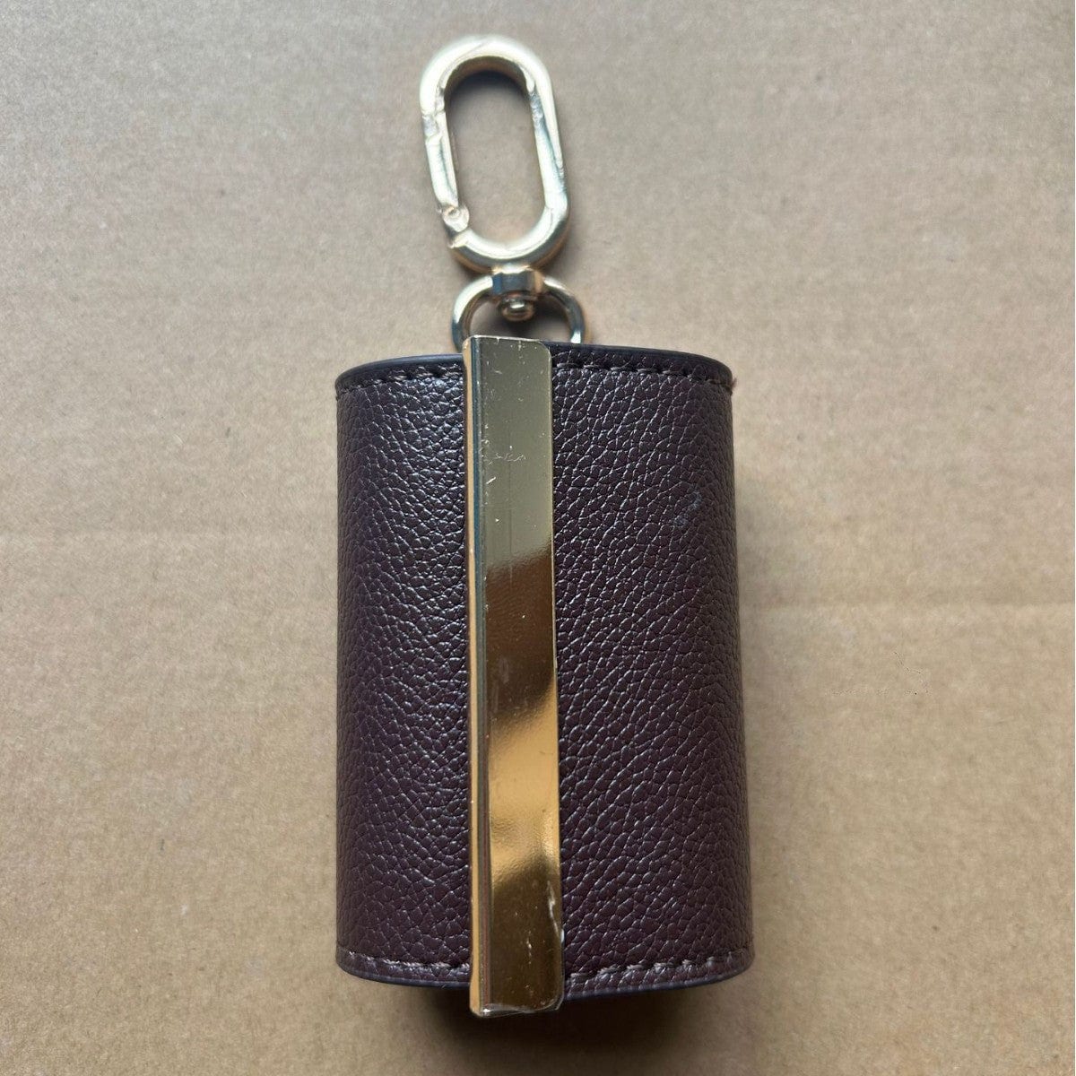 The pouch bag unfolded on a kitchen counter beside groceries